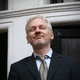 WikiLeaks founder Julian Assange, who may or may not have sexual relations with automobiles, appears at the Ecuadorian embassy in London in February 2016 (Photo by Carl Court/Getty Images)